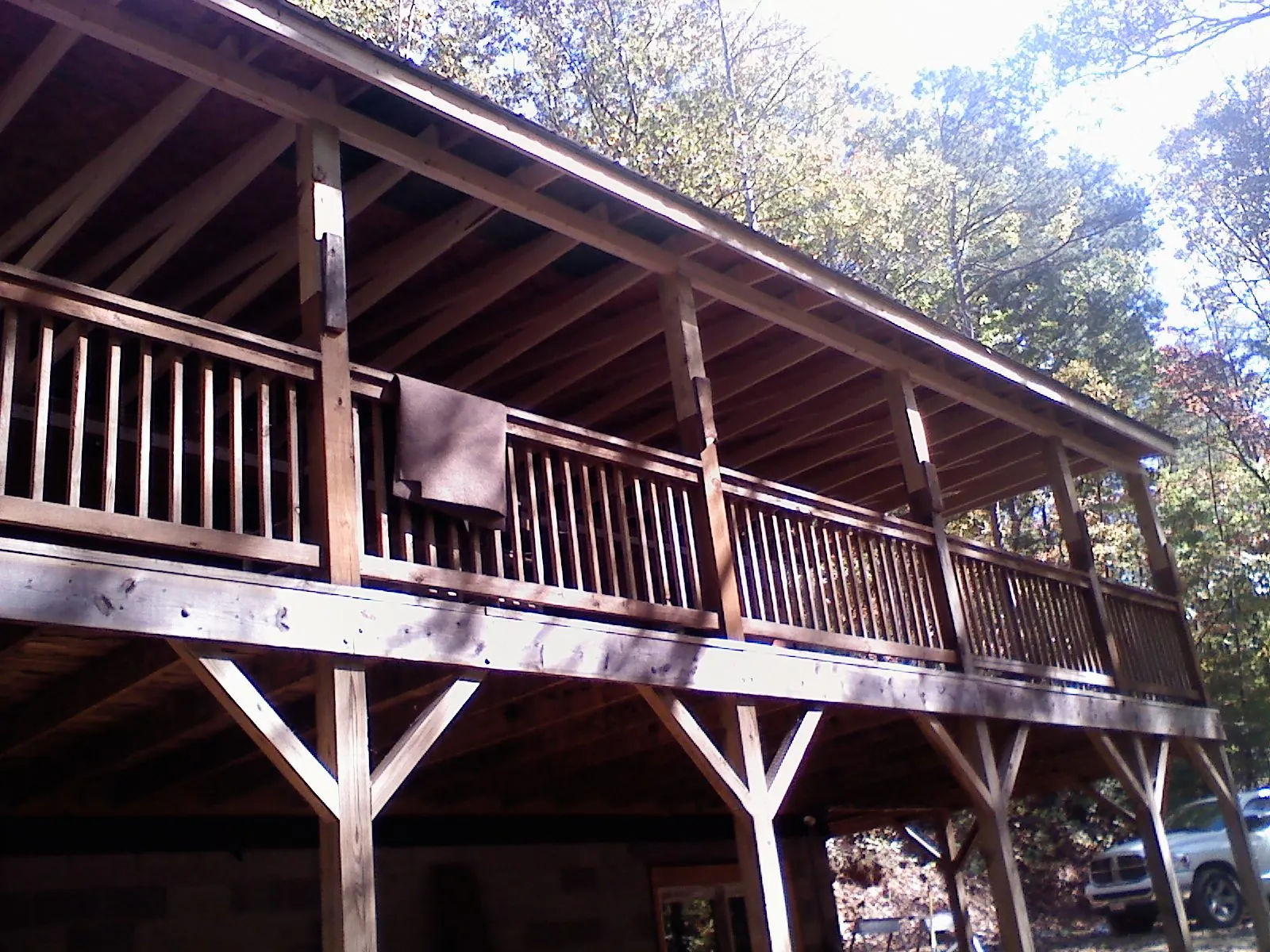 Timber framing under a new elevated porch and deck — Roof Leak Repair in Woodhaven by Roofing Brothers